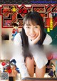 A magazine cover with a girl in a school uniform.